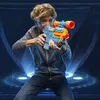 A young person aiming a toy gun with a scope. Podgląd zdjęcia produktu
