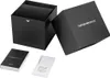 An open black box with a watch inside, and accompanying documentation. Produktbild-Vorschau