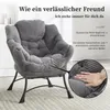A gray corduroy armchair with a metal frame, shown in a room setting with a bookshelf in the background. A close-up inset shows a hand touching the soft fabric. Produktbild-Vorschau