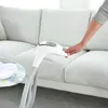 A person's hand is shown adjusting a part of a baby swing. Produktbild-Vorschau