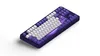 A dark purple mechanical keyboard with white and purple keycaps, set against a white background. Produktbild-Vorschau