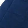 A close-up view of a quilted blue fabric. Náhľad obrázku produktu