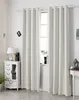 A room with white curtains covering a window, a white cabinet with drawers and a glass door, a lamp, and books. Produktbild-Vorschau