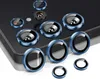 A collection of camera lens protectors arranged on a dark surface, possibly a phone. Produktbild-Vorschau