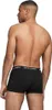 A man wearing black boxer briefs, viewed from the back. Produktbild-Vorschau