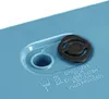 A close-up view of a blue plastic planter with a black rubber plug and instructions for drilling a drainage hole. Voir les images du produit