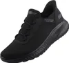 A black Skechers slip-on sneaker shown from a side-front angle on a white background. Voir les images du produit