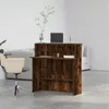 A reception desk in a modern office setting with a chair and a plant. Anteprima dell’immagine prodotto