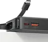 Close-up of a black power bank with a USB-C cable plugged in, showing ports and specifications. Náhled obrázku produktu