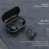 A pair of black wireless earbuds with their charging case, displayed on a dark gray surface. Produktbild-Vorschau