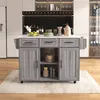 A kitchen island cart with drawers and cabinets is shown in a modern kitchen setting. Podgląd zdjęcia produktu