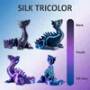 Four small dragon figurines with a color gradient effect, displayed with a color swatch indicating the color transition. Produktbild-Vorschau