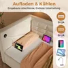 A beige upholstered sofa with integrated charging ports and devices connected. Produktbild-Vorschau