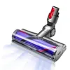 A vacuum cleaner brush head with a transparent casing showing a purple and red roller brush, set against a white background. Náhled obrázku produktu