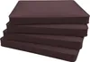 A stack of four brown cushions on a white background. Produktbild-Vorschau