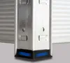 A close-up view of the corner of a metal shelving unit, showing the base with blue and black protective caps. Náhľad obrázku produktu