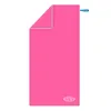 A pink microfiber towel with a blue loop is laid flat against a white background. The towel is folded at the top left corner, revealing a lighter shade of pink underneath. A small logo with the text 'NILS CAMP' is visible at the bottom right corner. Produktbild-Vorschau
