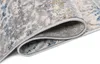 A close-up view of a rolled-up rug, showing the texture and pattern. Anteprima dell’immagine prodotto