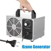 A hand is holding the handle of an ozone generator, with a power plug in the foreground. Produktbild-Vorschau