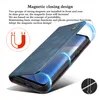 A blue flip-style phone case is shown open, revealing a phone screen inside. Blue energy lines emanate from the case, suggesting magnetic attraction. Náhled obrázku produktu