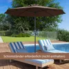 A patio umbrella shades two lounge chairs by a swimming pool. Anteprima dell’immagine prodotto