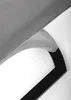 A close-up view of the edge of a gray fabric seat attached to a black frame. Produktbild-Vorschau