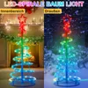 A split image showing a spiral LED Christmas tree light used indoors next to a fireplace and outdoors in the snow. Anteprima dell’immagine prodotto