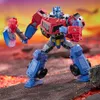 A Transformers action figure is posed in a dynamic stance against a fiery, sunset-like background. Anteprima dell’immagine prodotto