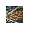 A close-up view of a board game with colorful tiles and game pieces. Produktbild-Vorschau