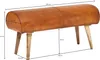 A product shot of a brown leather bench with wooden legs, featuring measurement annotations. Náhľad obrázku produktu