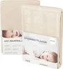Two folded beige baby bed sheets are shown, one in front of the other, with a label featuring a baby's face and product details. Produktbild-Vorschau