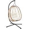 A hanging egg chair with a stand and cushion, isolated on a white background. Náhľad obrázku produktu