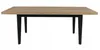 A rectangular table with a light brown wooden top and four black legs, isolated on a white background. Náhled obrázku produktu