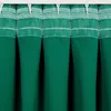 A close-up view of a green curtain hanging from a white curtain rod. Produktbild-Vorschau