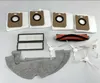 A collection of robot vacuum cleaner accessories laid out on a white background. Voir les images du produit