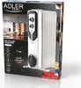 The image shows the packaging of an Adler oil-filled radiator. The packaging features a picture of the radiator itself, along with various icons and text detailing its features and specifications. A lifestyle image of a room with furniture is also visible  Voir les images du produit