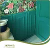 A corner of a room with floral wallpaper and teal wainscoting, featuring a basket and a round box. Podgląd zdjęcia produktu