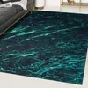 A rug with a marble pattern is placed on the floor next to a sofa. Podgląd zdjęcia produktu