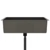 A close-up, front view of a dark gray sink with a black rim and a flexible drain pipe attached underneath, set against a white background. Produktbild-Vorschau