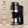 A black and silver coffee maker with integrated grinder and thermal carafe, shown with feature callouts and dimensions. Produktbild-Vorschau