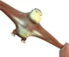 A stretchy toy gorilla with wings is being held by a hand. Náhled obrázku produktu