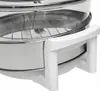 A close-up view of the handle and glass bowl of a halogen oven. Voir les images du produit