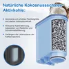 A cutaway view of a water filter cartridge filled with activated charcoal, next to a coconut and water splash. Produktbild-Vorschau