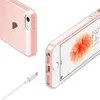 A clear protective case for an iPhone 5/5S/SE is shown from two angles, with a charging cable in the foreground. Produktbild-Vorschau