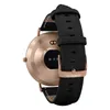 The back of a smartwatch with a black leather strap and a gold-colored casing. Podgląd zdjęcia produktu