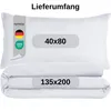 A white pillow and a folded white duvet are shown against a white background. Text overlays indicate dimensions and certifications. Produktbild-Vorschau
