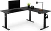 A black L-shaped standing desk with a monitor, keyboard, headphones, and a small plant. Náhled obrázku produktu