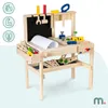 A wooden toy workbench with various tools and building blocks. Náhled obrázku produktu