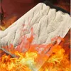 Beiges Thermo-Fleecefutter mit schwarzem elastischem Bund, umgeben von digitalen Flammen Produktbild-Vorschau