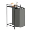 A laundry basket with a shelf on top, placed on a white background. Produktbild-Vorschau